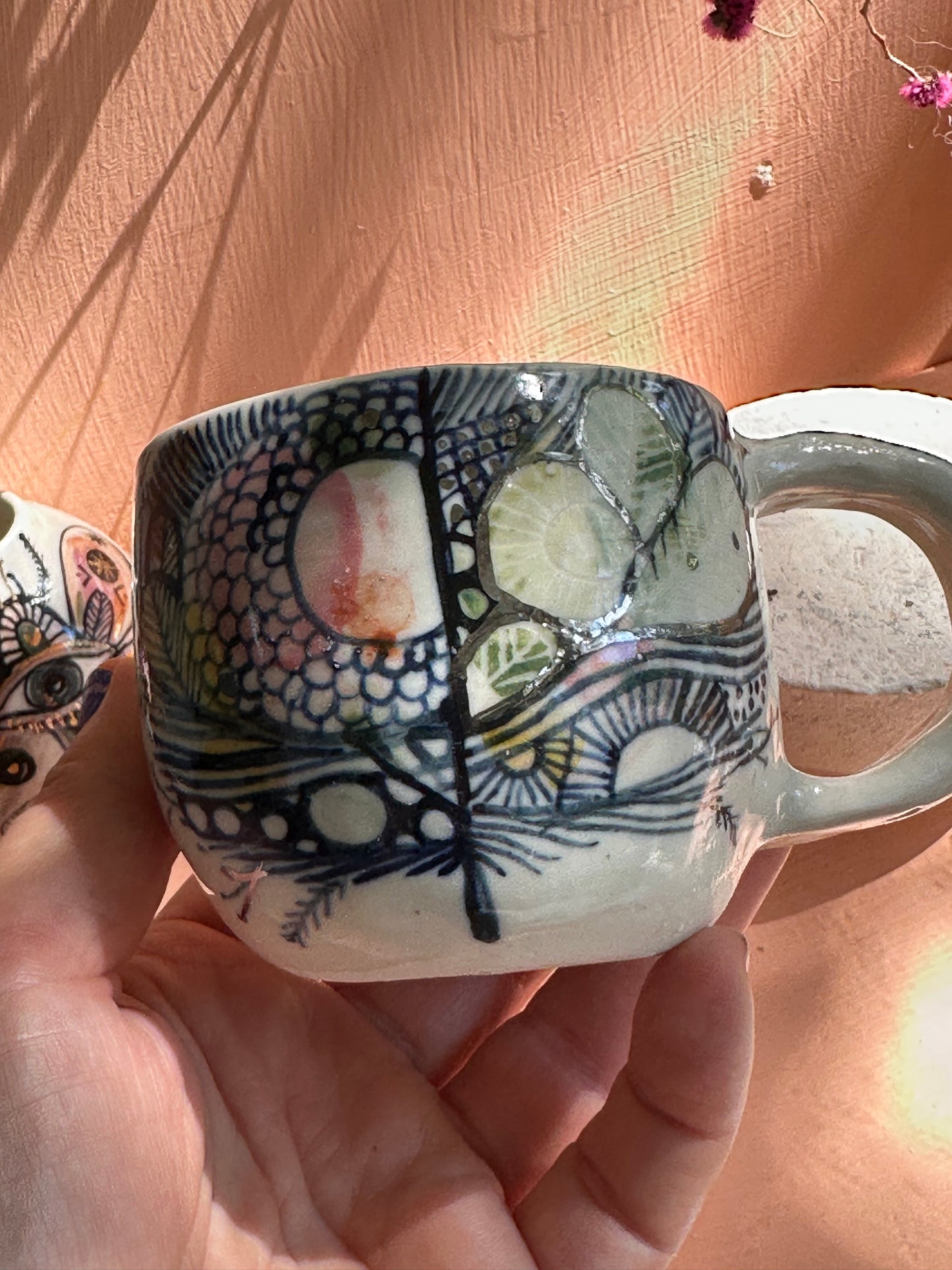 ‘Feather’ hand painted cup