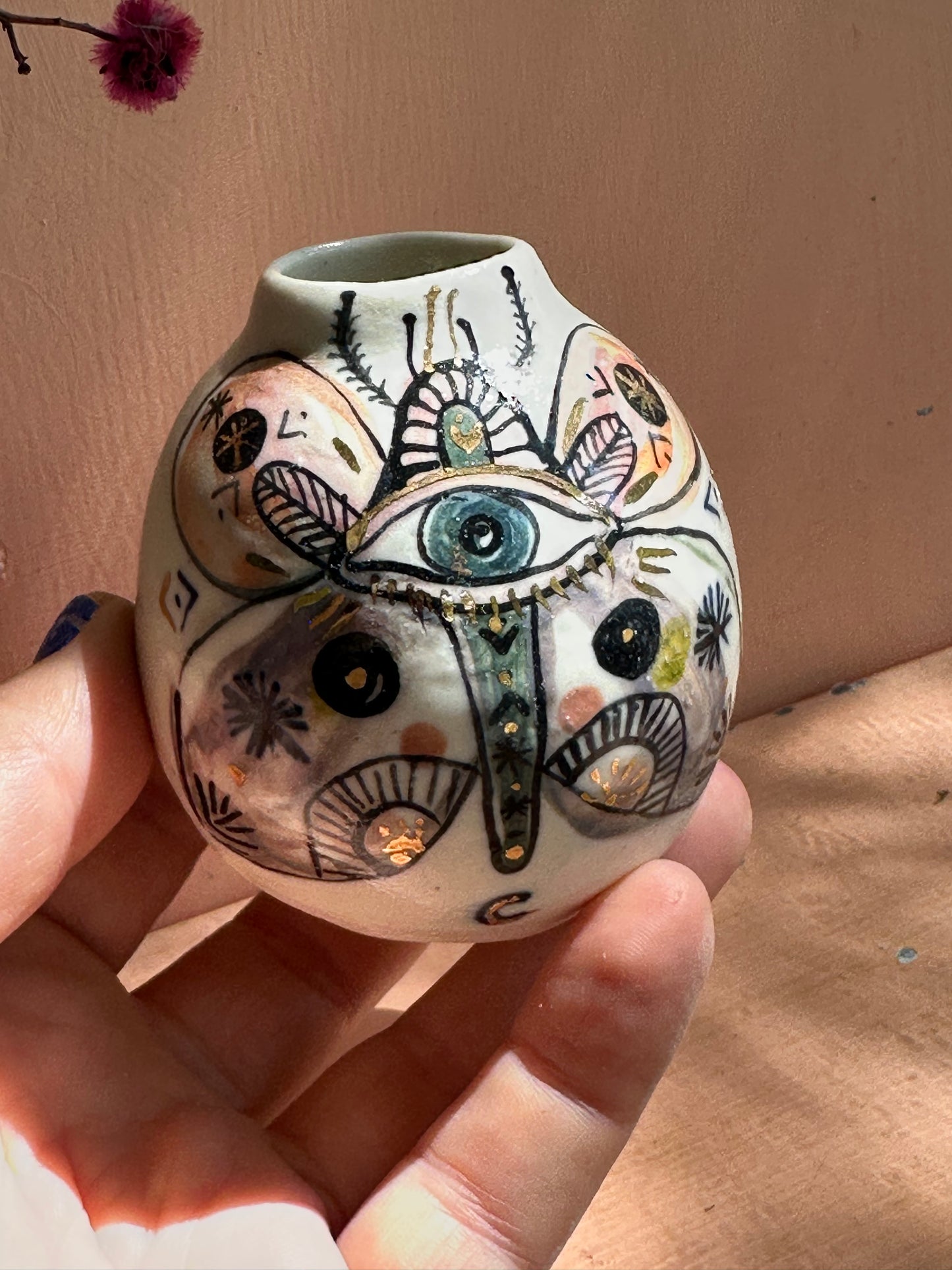 ‘Hand painted ‘the protective eye’ moth vase