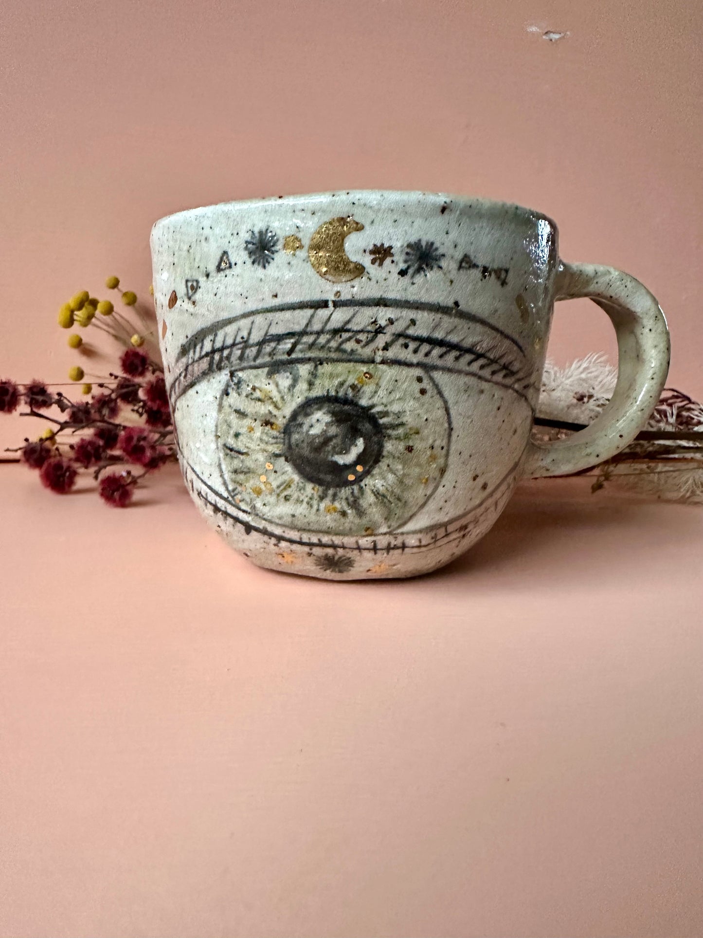 One ‘protective eye’ hand painted cup