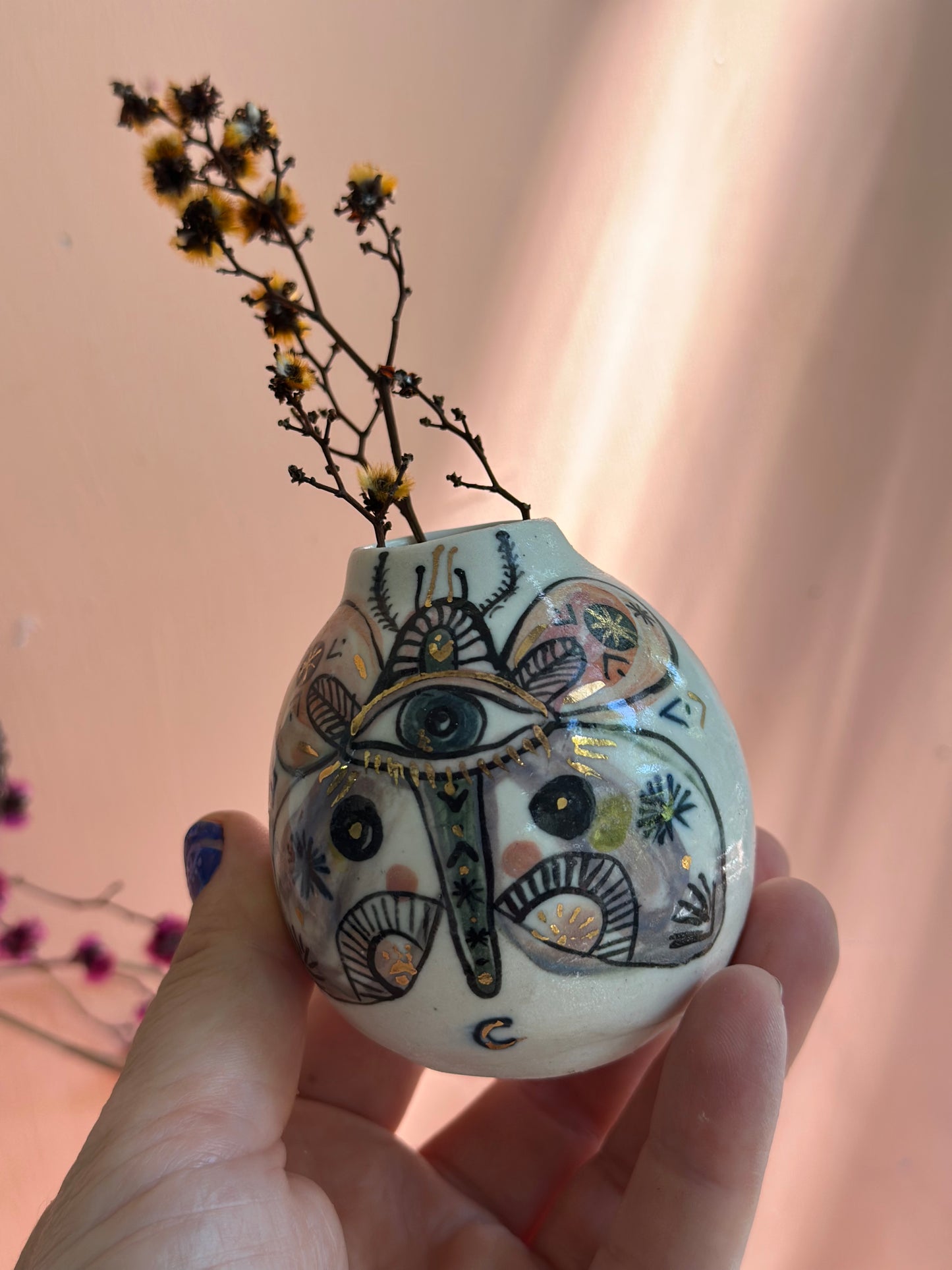 ‘Hand painted ‘the protective eye’ moth vase