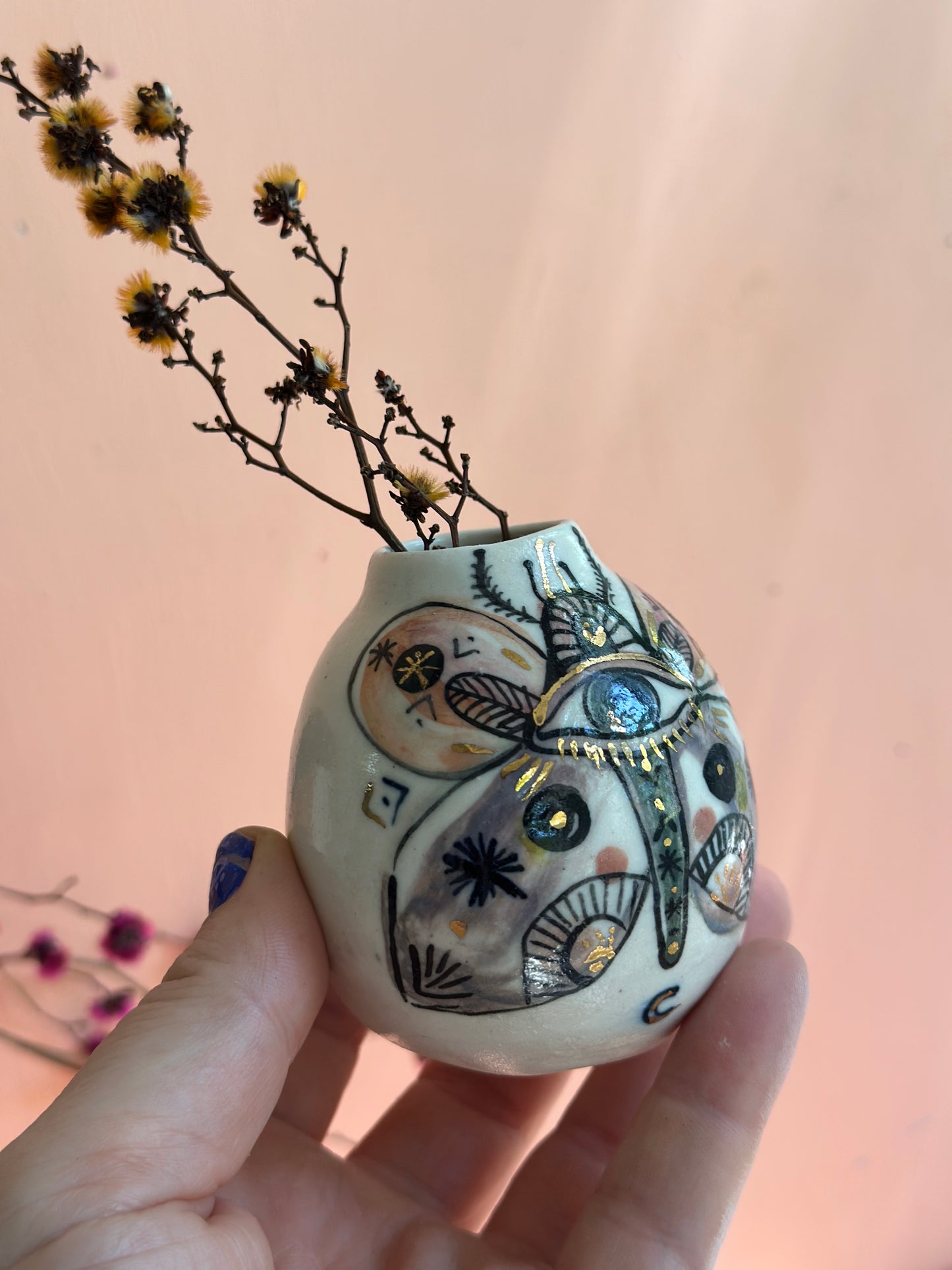 ‘Hand painted ‘the protective eye’ moth vase