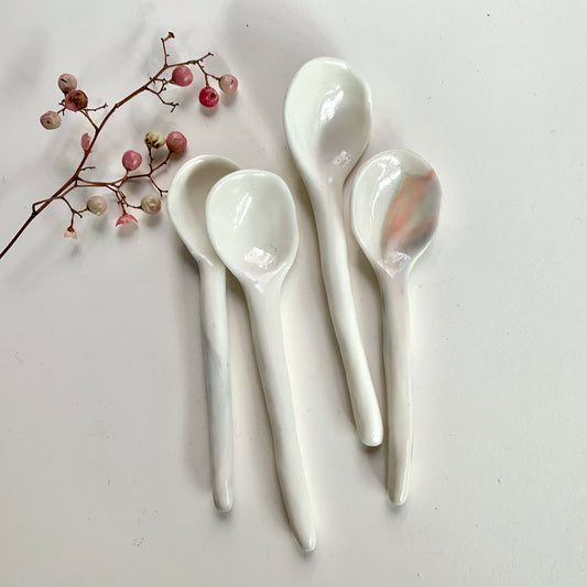 One porcelain small spoon